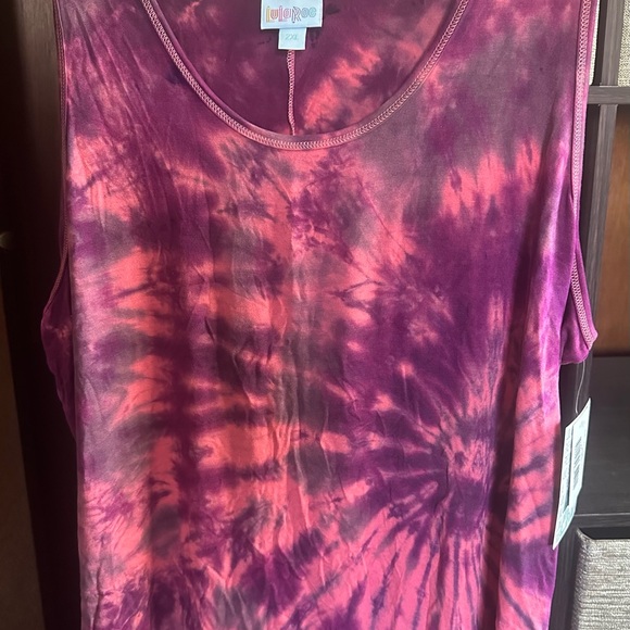LuLaRoe Tops - LuLaRoe peachy/pink & purple loose-fitting Tank Top with Tie-Dye Design